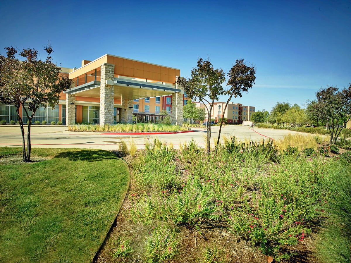 Commercial landscape design for Cascades Fairfield Inn & Suites in the Colony TX